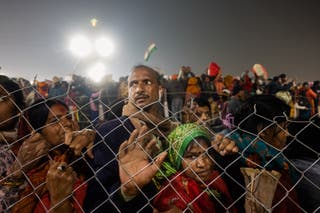 Devotees are trapped in a crowd at the